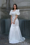 Bridal gown with square neckline and puff sleeves and pearls by caelinyc