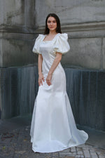 Bridal gown with square neckline and puff sleeves and pearls by caelinyc